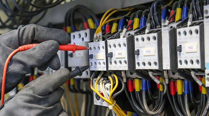 Electrician-With-Gloves-Testing